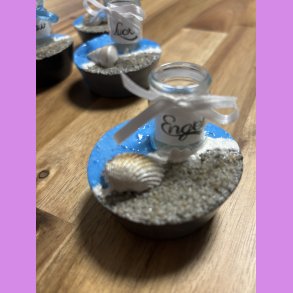 Beton cirkel med tekst Engel