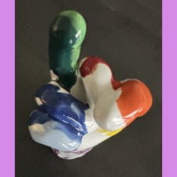 Fuckfinger figur Nr. 5 - Hvid og regnbuefarvet. 