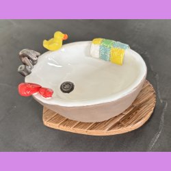 Badekar med badeand og t�fler