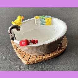 Badekar med badeand og t�fler