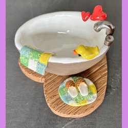 Badekar med badeand og t�fler