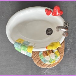 Badekar med badeand og t�fler
