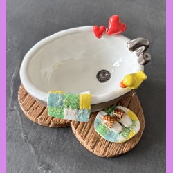 Badekar med badeand og t�fler