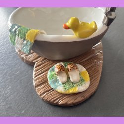 Badekar med badeand og t�fler