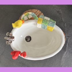 Badekar med badeand og t�fler