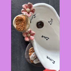 Badekar med tekst "LOVE". Blomster - hjerter og klipklapper