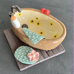 Badekar Brun med solsikker i.