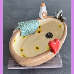 Badekar Brun med solsikker i.