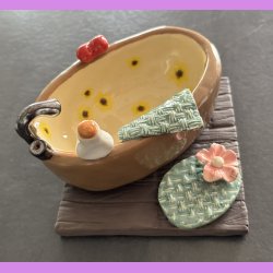 Badekar Brun med solsikker i.