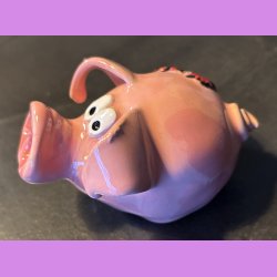 Gris med hjerte lap p numsen