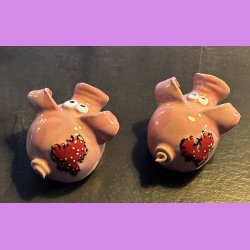 Gris med hjerte lap p numsen