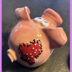 Gris med hjerte lap p numsen