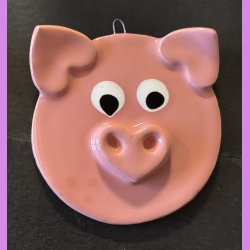 Julegrise med hjerte tryne og re. 