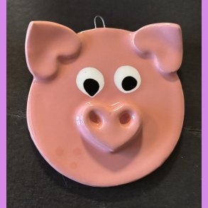 Julegrise med hjerte tryne og re. 