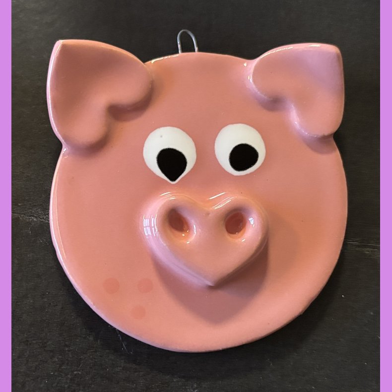 Julegrise med hjerte tryne og re. 