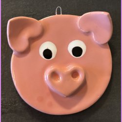 Julegrise med hjerte tryne og re. 