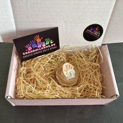 Medalje med appelsin