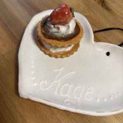 Medalje med jordbr p tallerken