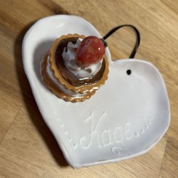 Medalje med jordbr p tallerken