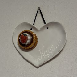 Medalje med jordbr p tallerken