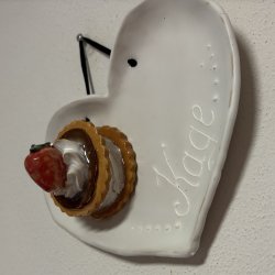 Medalje med jordbr p tallerken