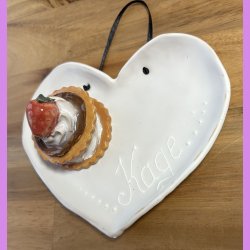 Medalje med jordbr p tallerken