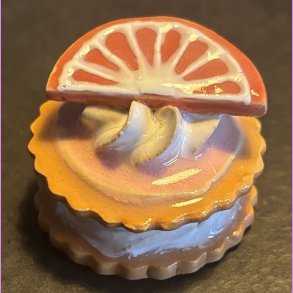 Medalje med appelsin - lyser�d glasur