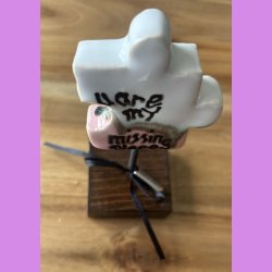 Puslebrik lyserd Med "Dream" skilt