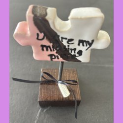 Puslebrik lyserd Med "Blessed" skilt