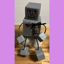 Krligheds robotter med mrk pink hjerte